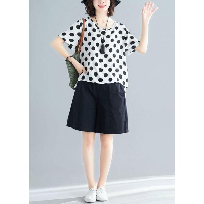 white dotted casual blended pullover and black elastic waist shorts